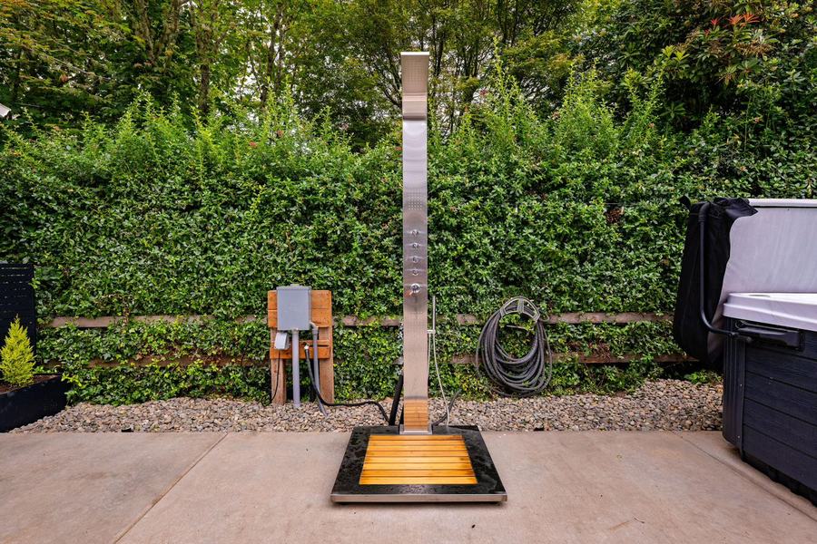 Heated outdoor shower on a cedar platform